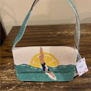 Beaded bag with a diver, green and cream